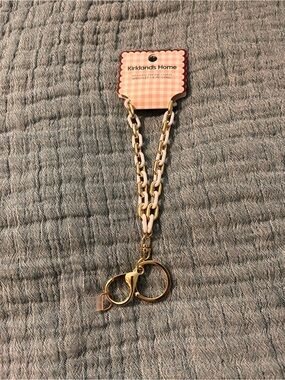 Kirklands white and Gold phone Wristlet /Key Holder chain